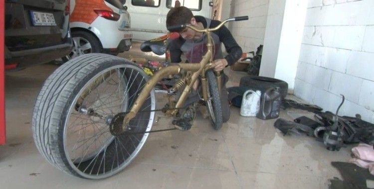 Lastiği sürekli patlayan bisikletine çözümü otomobil lastiğinde buldu