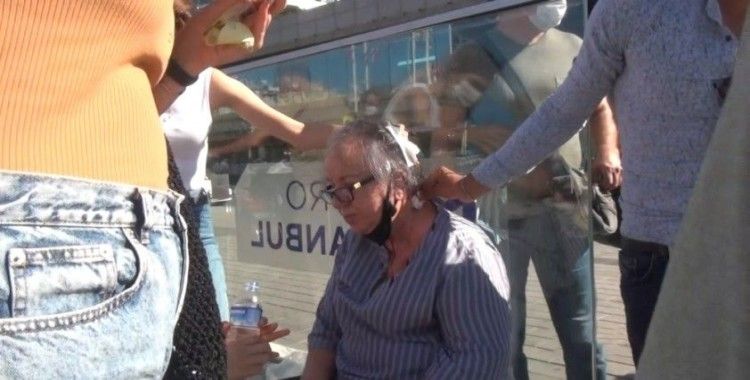 Taksim'de yaralı kadını aracına almayan taksici tepki topladı
