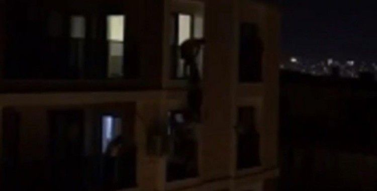 Sinir krizi geçirerek 5. kattan atlamaya kalkan kadını alt kattaki genç kurtardı