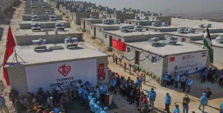 Hayırseverlerin desteğiyle İdlib'de yapılan 600 konut ailelere teslim edildi