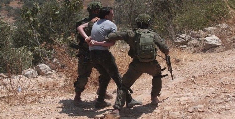 İsrail güçleri Batı Şeria'da 12 Filistinliyi gözaltına aldı