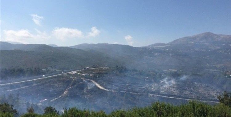 Suriye'de çıkan ve Türkiye'ye sıçrayan yangın kontrol altına alındı