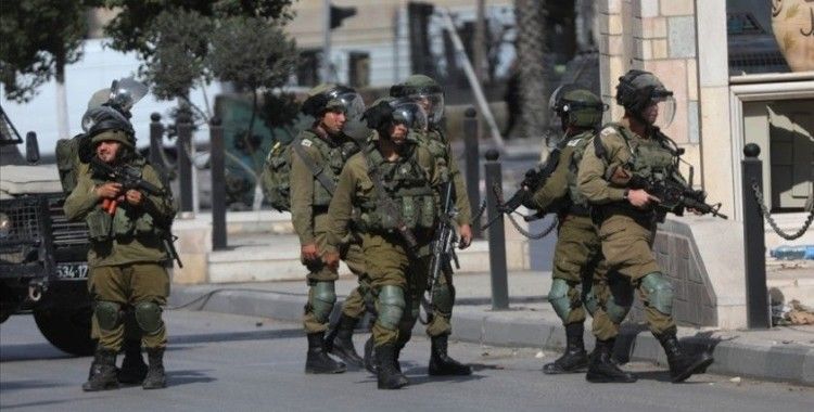 İsrail güçleri ikisi çocuk 13 Filistinliyi gözaltına aldı