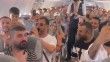 Diyarbakır-Antalya uçağında baba ve oğullarının zurna ve dabrukalı eğlencesi