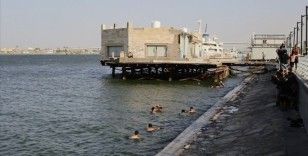 Aşırı sıcaklara sahne olan Basra'da uzun süreli elektrik kesintileri yaşanıyor