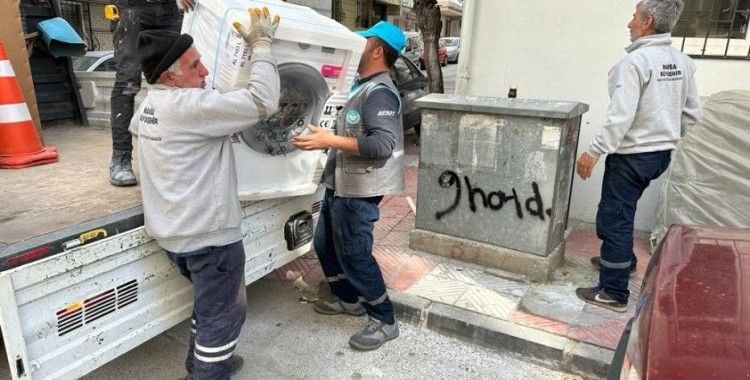 Evi yanan aileye yardım eli
