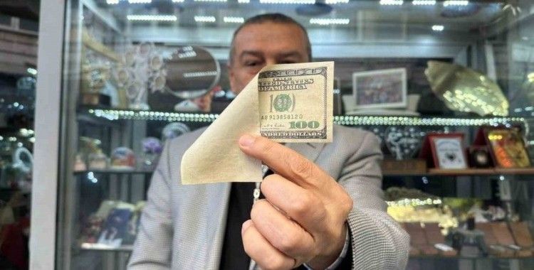 Bir tarafı olmayan hatalı basım 100 doları satışa çıkardı
