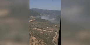 İzmir'in Torbalı ilçesinde çıkan orman yangınına müdahale ediliyor
