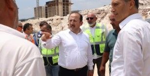 Vali Pehlivan, Yenişehir ilçesinde toplu konut inşaatında incelemelerde bulundu
